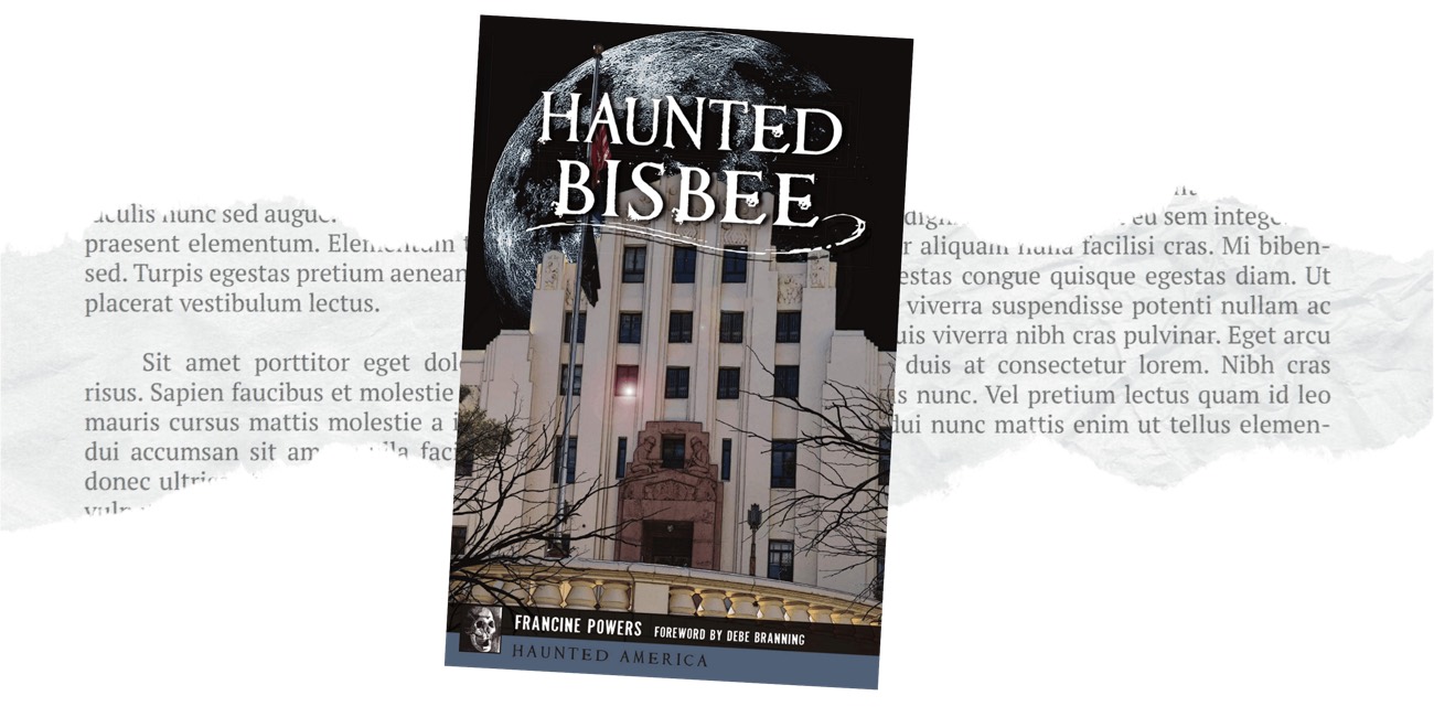 Book cover for Haunted Bisbee by Francine Powers with an art deco building