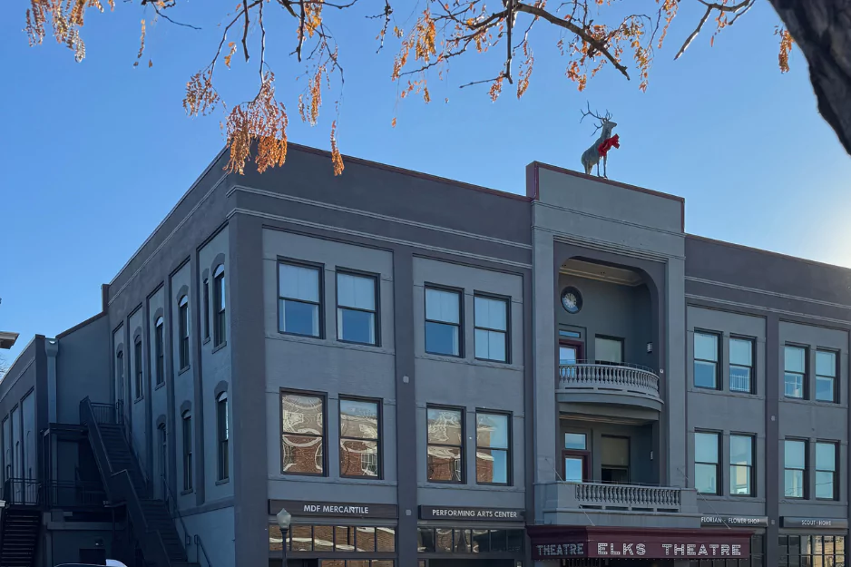 The Elks Theatre building in Prescott with an elk statue on its rooftop