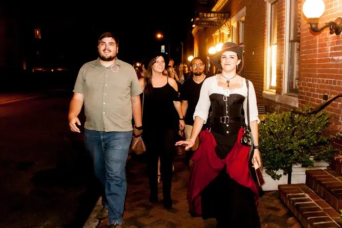 Costumed guide leading a haunted pub walking tour in Chicago