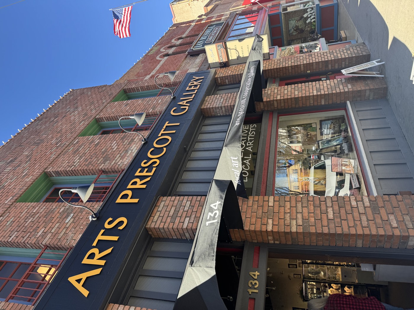 Rebuilt in brick after the Great Fire of 1900 leveled Whiskey Row, these storefronts now house local artists instead of saloons.