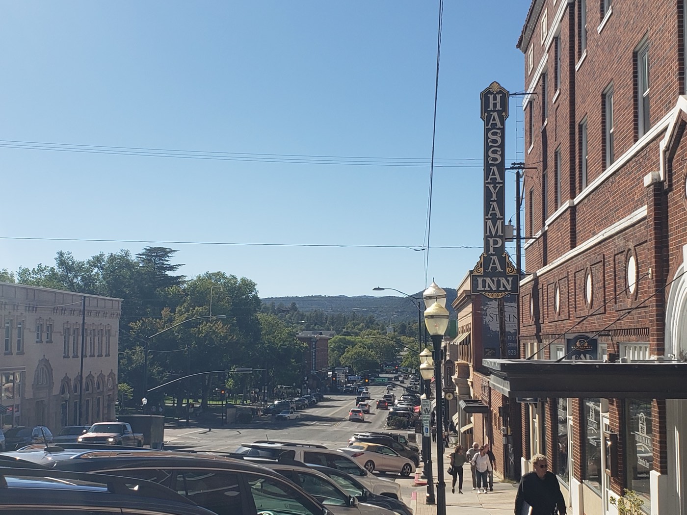 The Hassayampa Inn's vintage blade sign towers over Gurley Street where the route drops toward Courthouse Plaza.