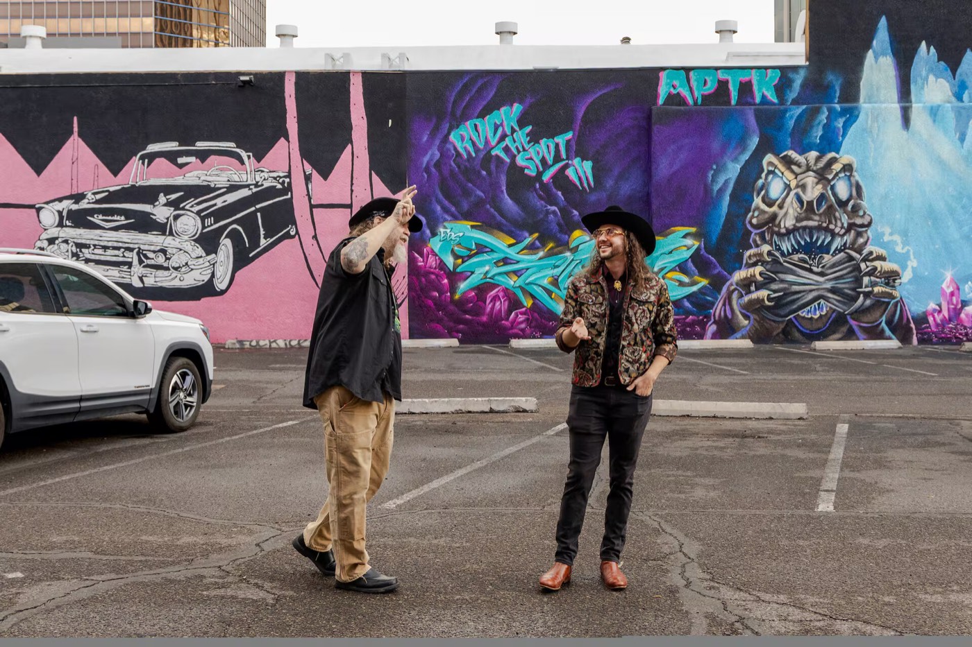 Freaky Foot Tours guides at the Rock the Spot graffiti wall